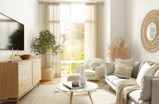 Een herfstige woonkamer met houten meubels, planten en warme stoffen